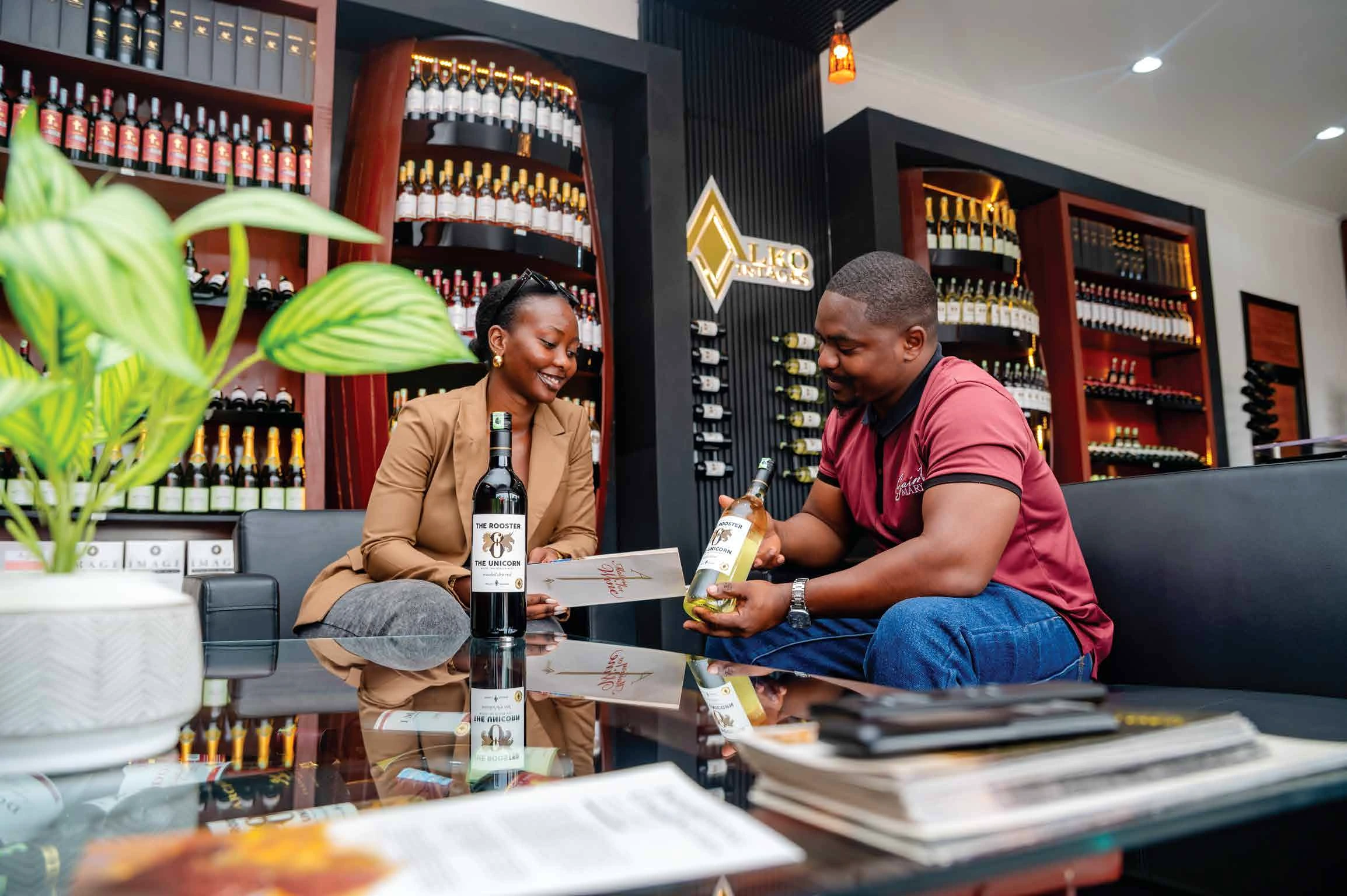 Alko wine specialist guiding a customer through a bottle selection